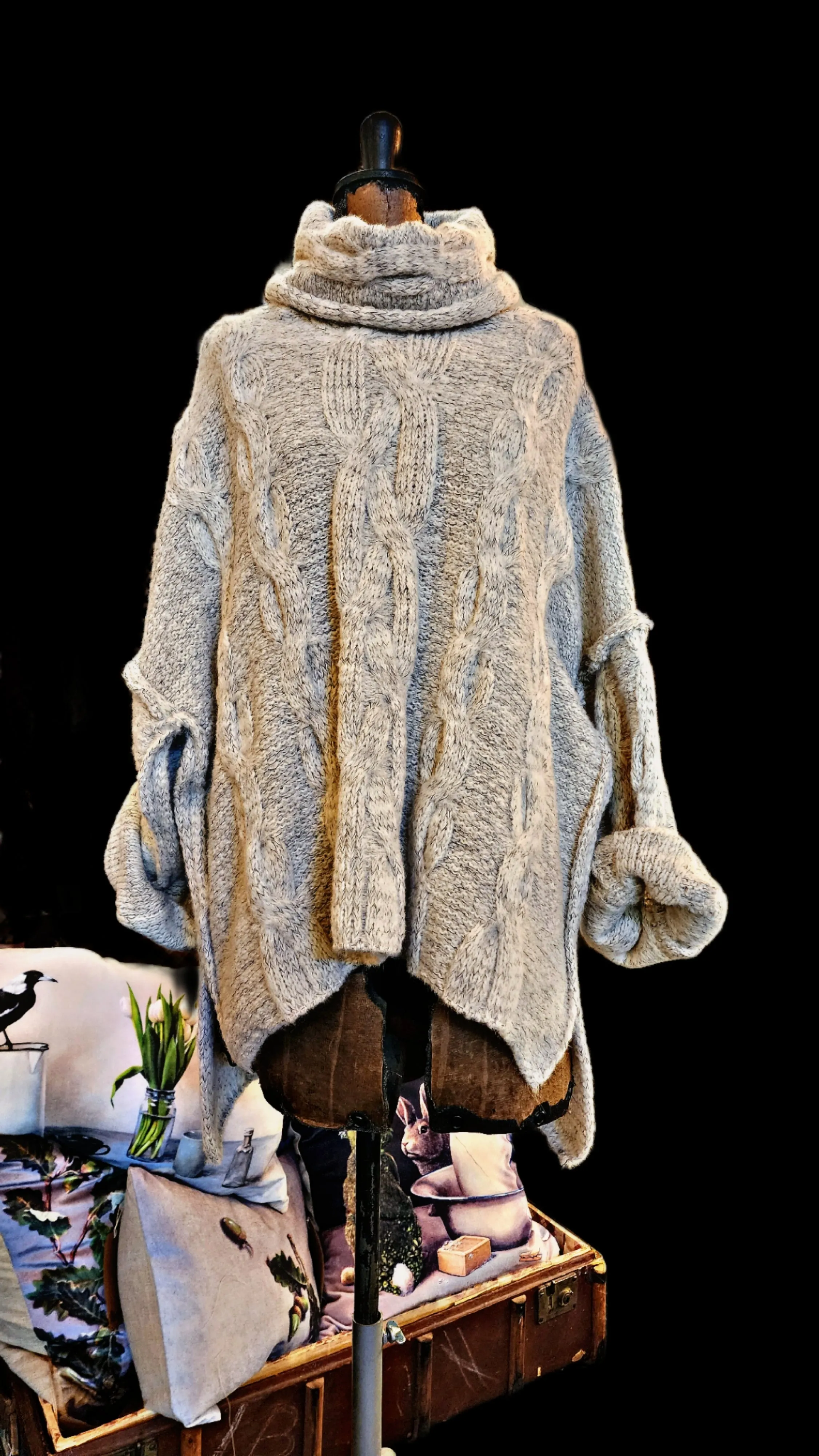 Oversize cable knit funnel neck sweater