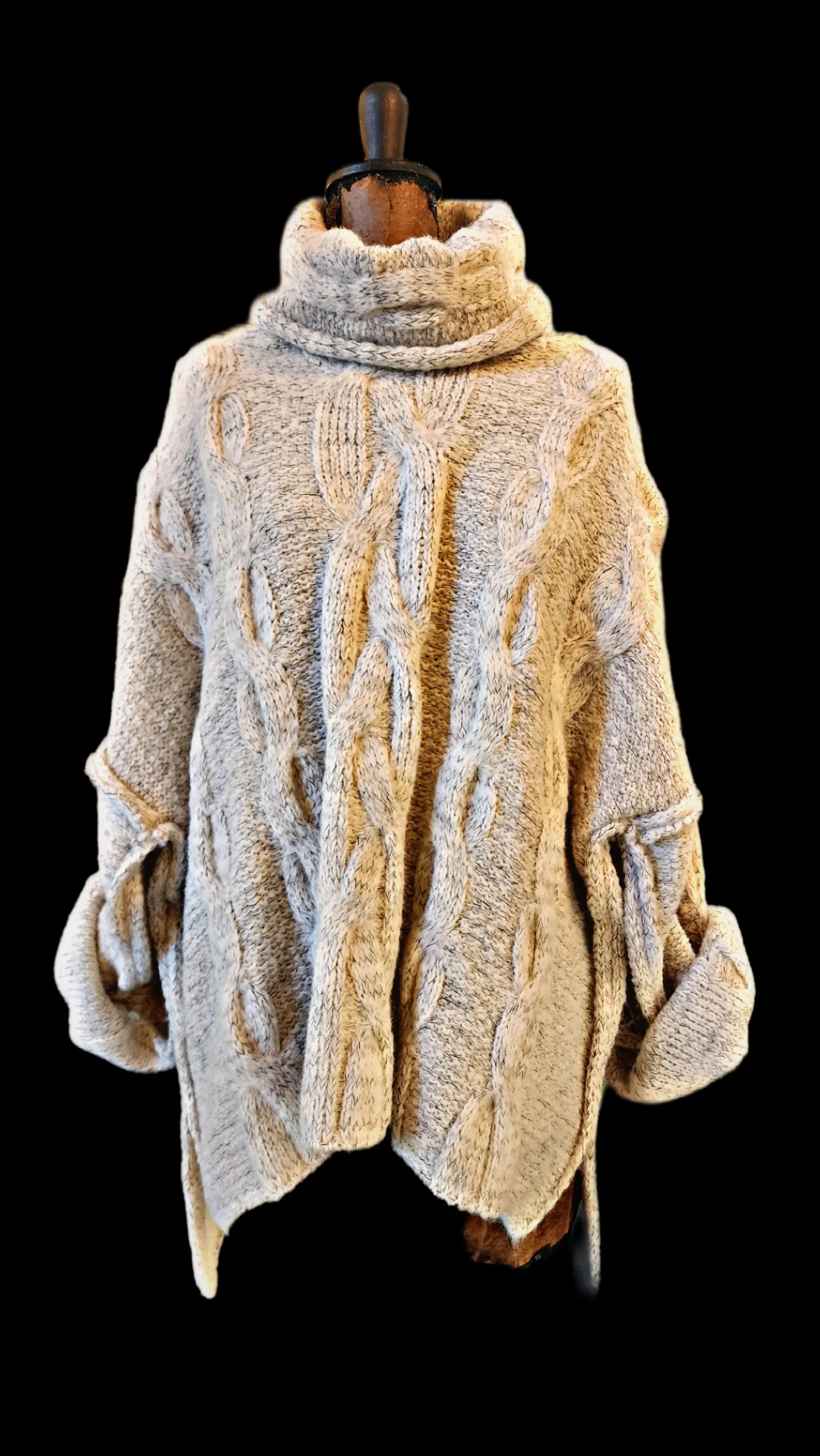 Oversize cable knit funnel neck sweater