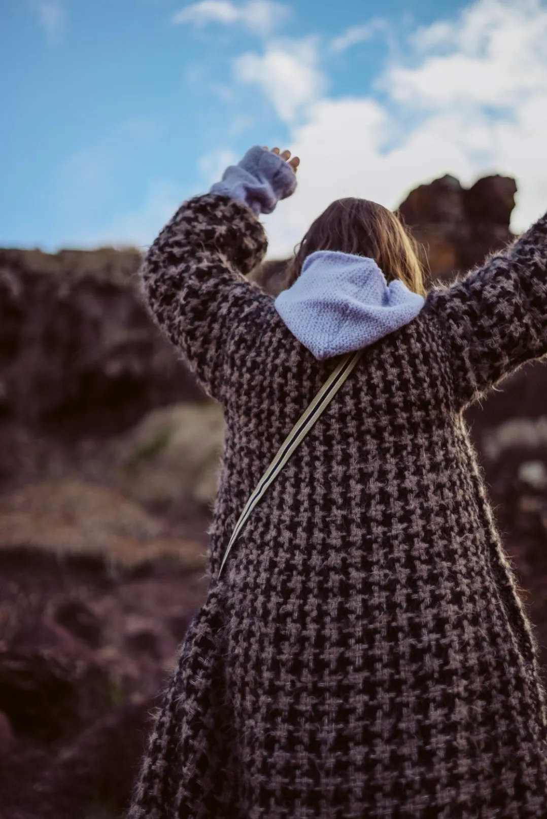 Oversize cable knit funnel neck sweater