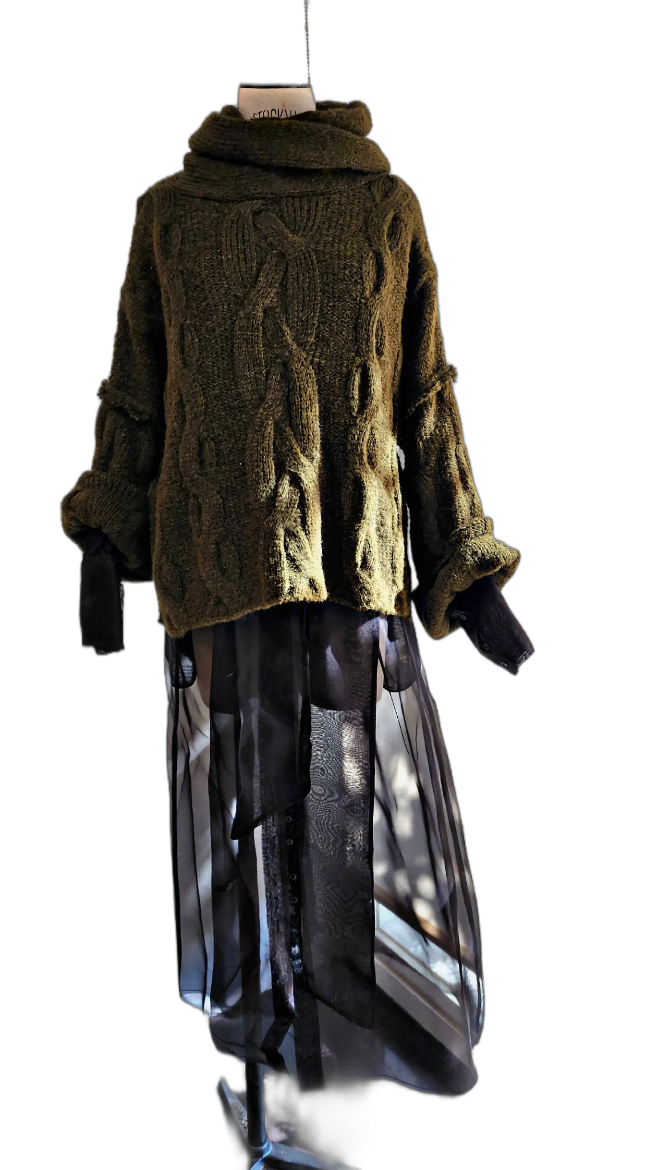 Oversize cable knit funnel neck sweater