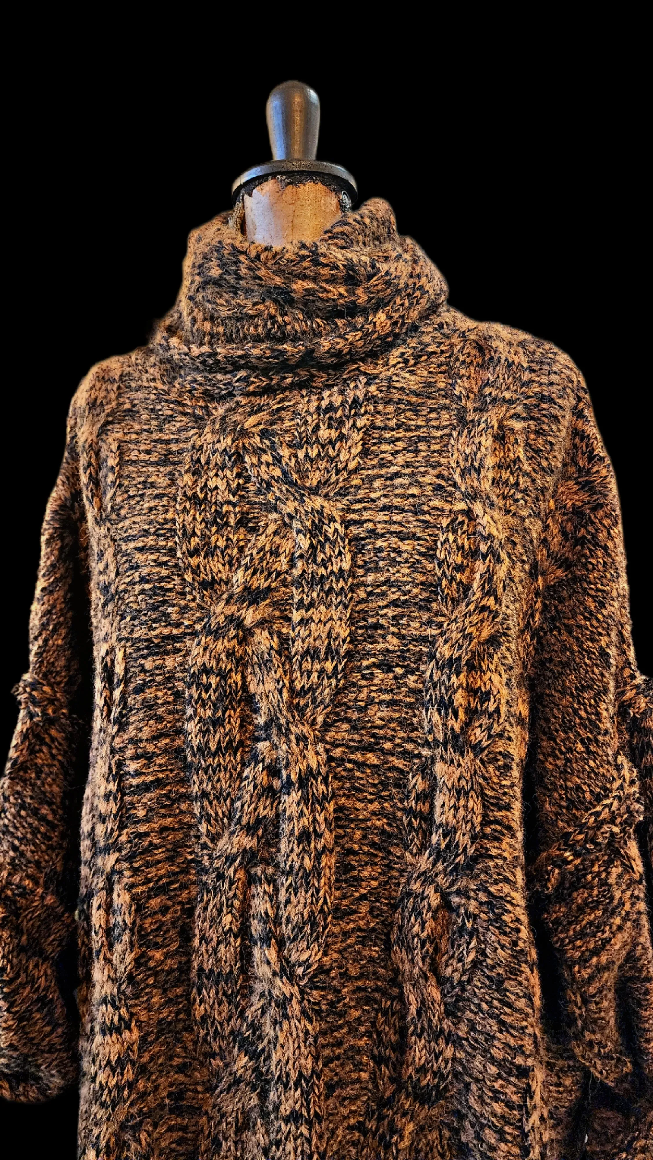Oversize cable knit funnel neck sweater