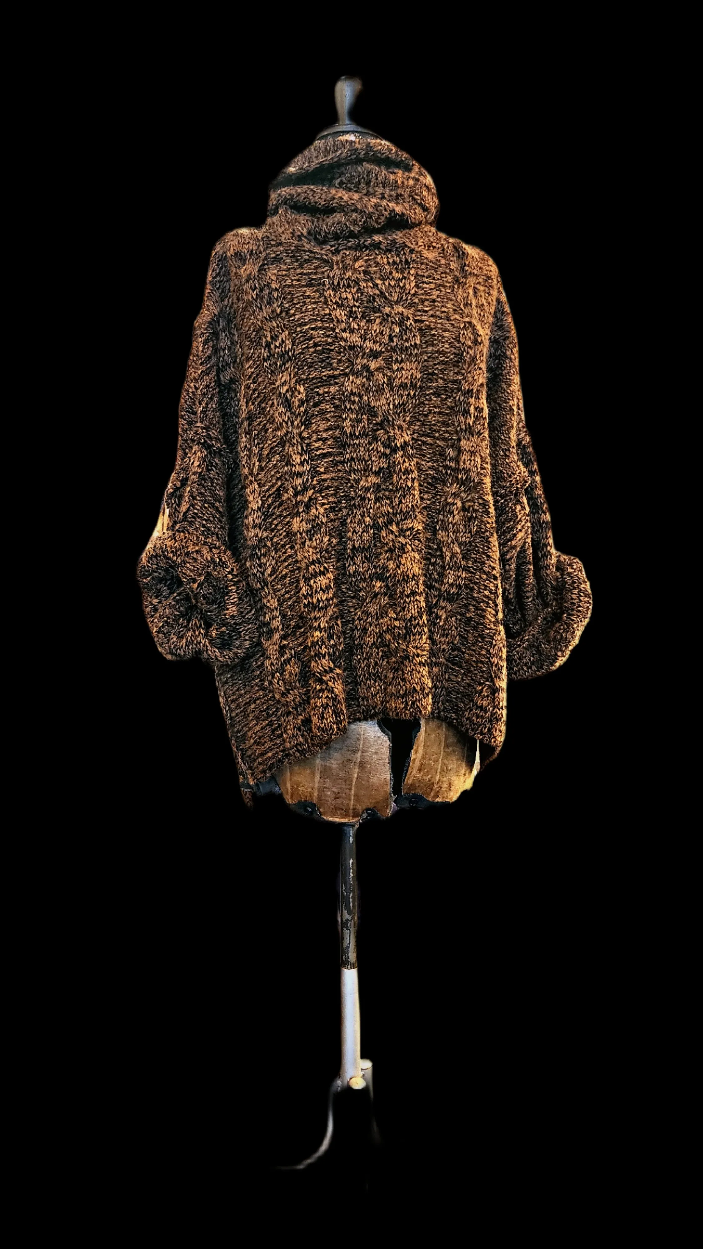 Oversize cable knit funnel neck sweater