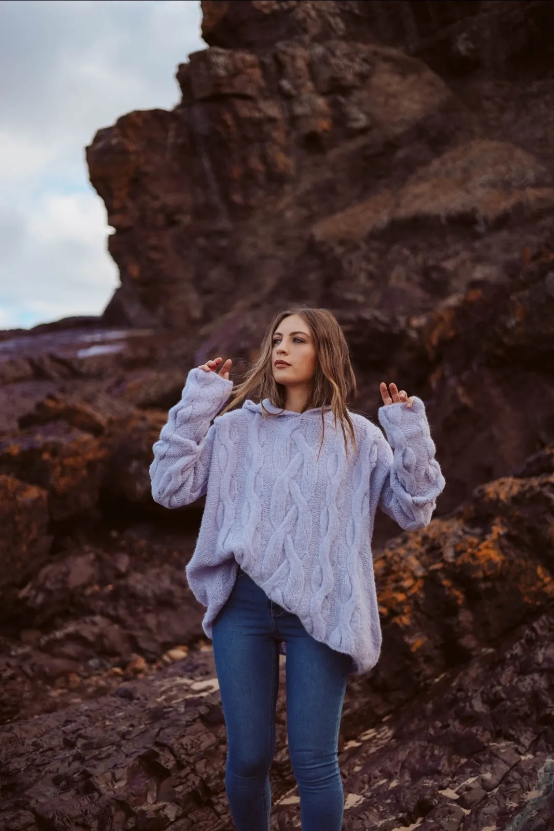 Oversize cable knit funnel neck sweater