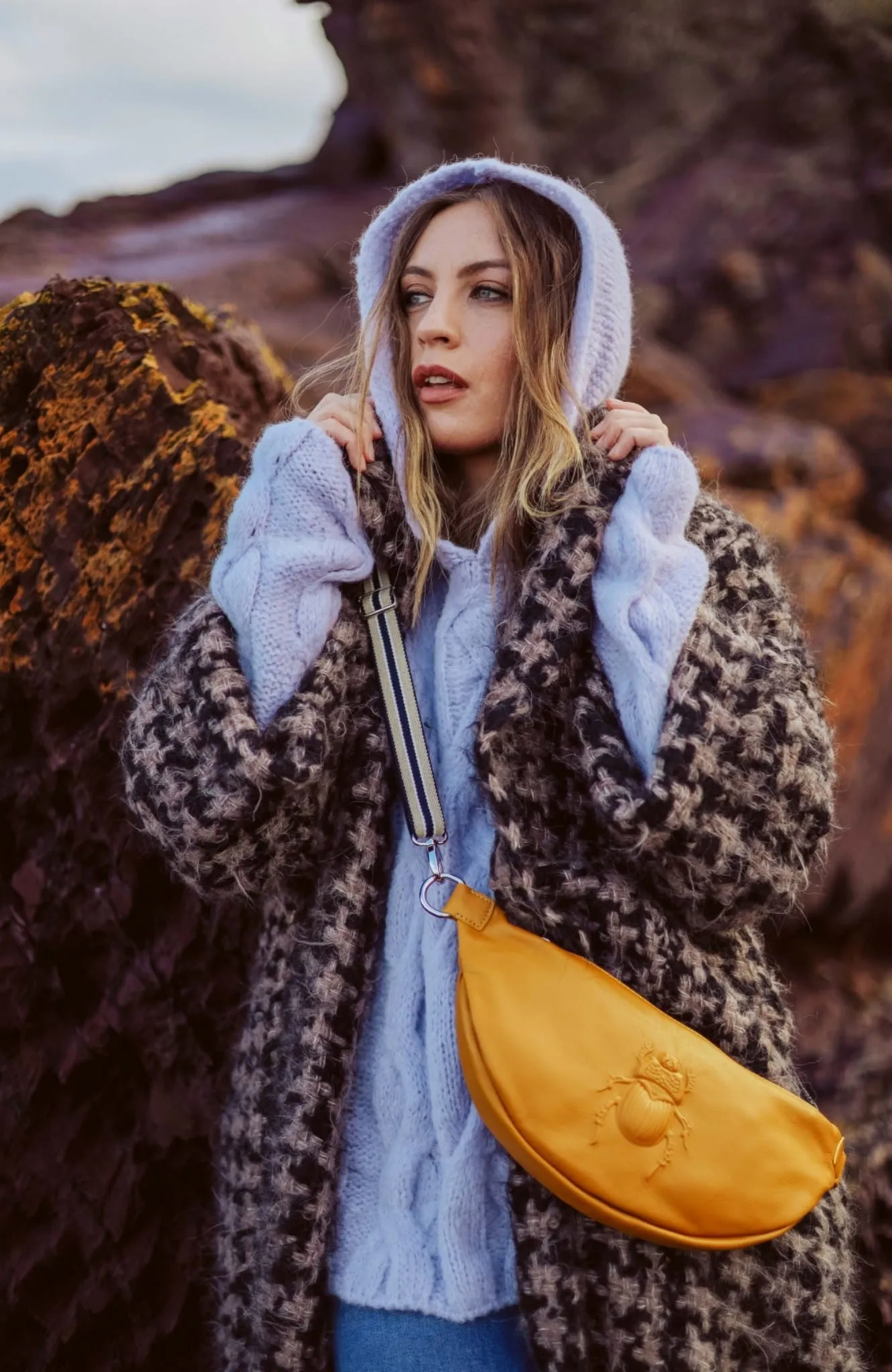 Oversize cable knit funnel neck sweater